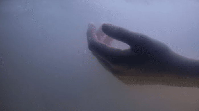 Screenshot 2026-03-06 133539 - N9BO℠ | Global Underwater Services Ltd A human hand is reaching upward through a hazy, misty atmosphere, with soft, diffused light creating an ethereal and mysterious mood.